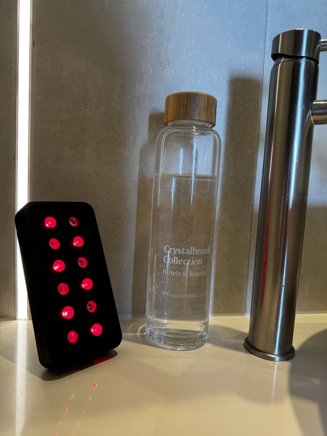 Device on a hotel bathroom bench while travelling