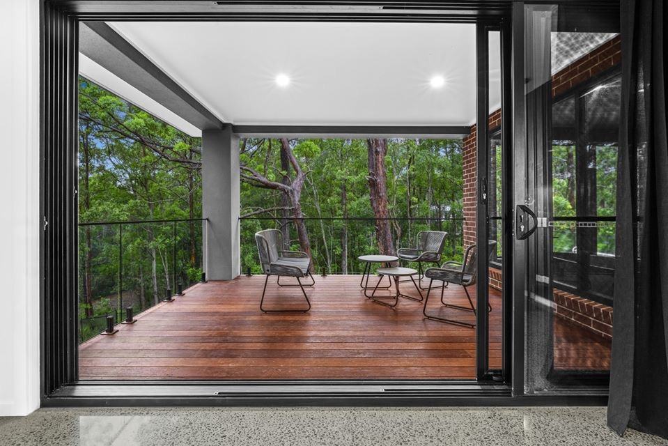 Covered hardwood deck in the trees