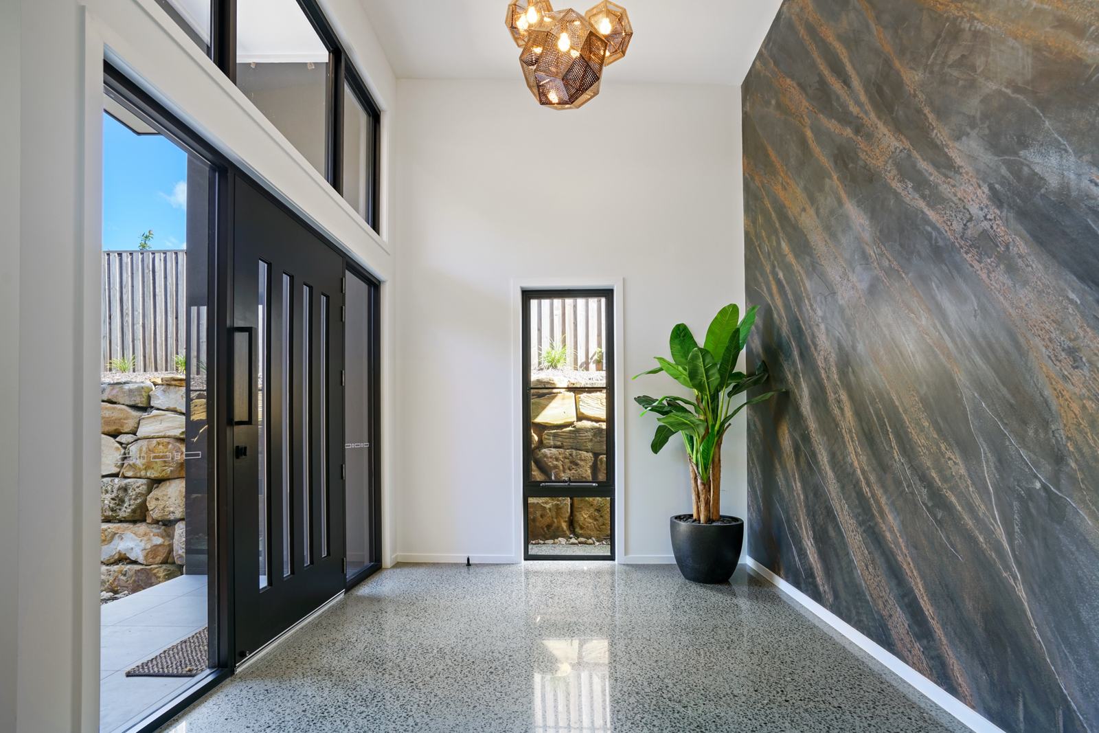 Entry with feature plaster wall